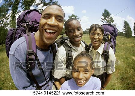 Parents hiking with their son and daughter View Large Photo Image Stock Image - Parents hiking with their son and daughter. Fotosearch