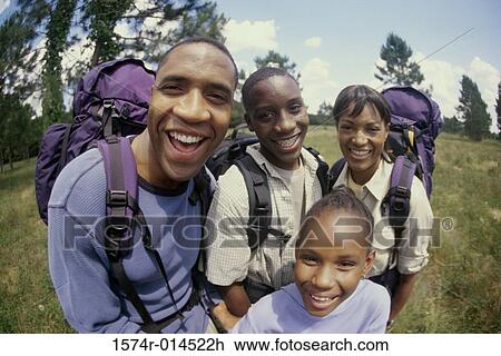 Parents hiking with their son and daughter View Large Photo Image Stock Image - Parents hiking with their son and daughter. Fotosearch