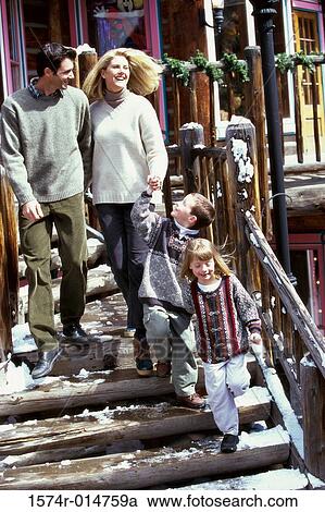 Parents walking with their son and daughter View Large Photo Image Stock Image - Parents walking with their son and daughter. Fotosearch