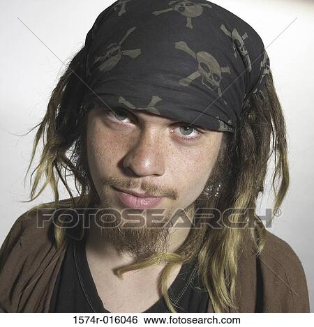 Stock Photograph - Portrait of a man wearing a bandana. Fotosearch