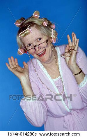 Portrait of a senior woman gesturing View Large Photo Image Stock Image - Portrait of a senior woman gesturing. Fotosearch
