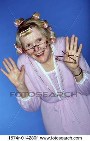 Stock Image - Portrait of a senior woman gesturing. Fotosearch