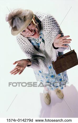 Portrait of a senior woman smiling View Large Photo Image Stock Image - Portrait of a senior woman smiling. Fotosearch