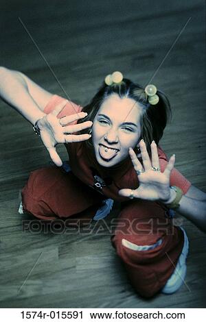 Portrait of a teenage girl dancing View Large Photo Image Stock Image - Portrait of a teenage girl dancing. Fotosearch