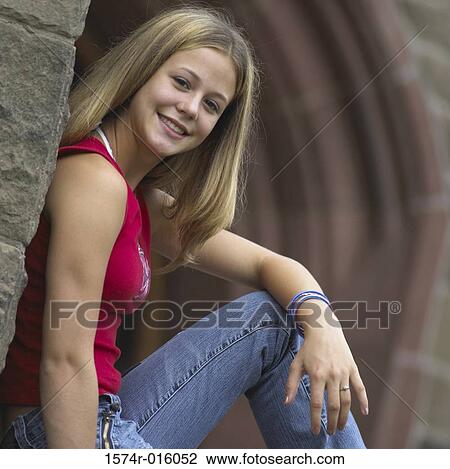 Portrait of a teenage girl smiling View Large Photo Image Stock Image - Portrait of a teenage girl smiling. Fotosearch