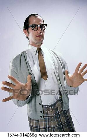 Stock Image - Portrait of a young man gesturing. Fotosearch
