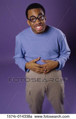 Stock Image - Portrait of a young man smiling. Fotosearch