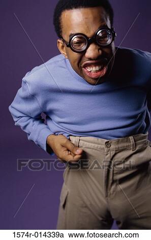 Stock Image - Portrait of a young man smiling. Fotosearch