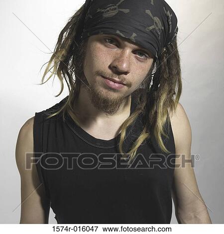 Stock Photo - Portrait of a young man wearing a bandana. Fotosearch