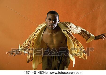 Portrait of a young man with his shirt unbuttoned View Large Photo Image Stock Image - Portrait of a young man with his shirt unbuttoned. Fotosearch