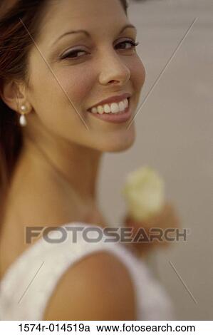 Portrait of a young woman smiling View Large Photo Image Stock Image - Portrait of a young woman smiling. Fotosearch