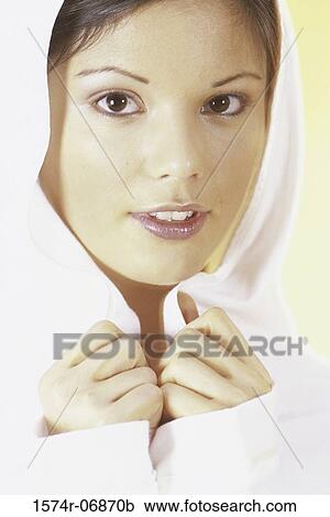Stock Image - Portrait of a young woman smiling. Fotosearch