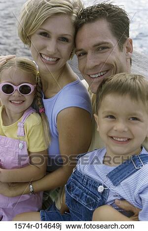 Portrait of parents with their son and daughter View Large Photo Image Stock Image - Portrait of parents with their son and daughter. Fotosearch