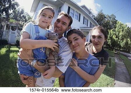 Stock Image - Portrait of parents with their son and daughter. Fotosearch