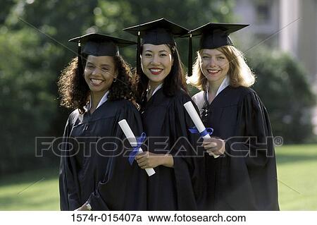 Portrait of three young women wearing graduation gowns and holding diplomas View Large Photo Image Stock Image - Portrait of three young women wearing graduation gowns and holding diplomas. Fotosearch