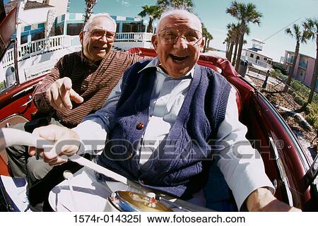 Portrait of two senior men sitting in a convertible car View Large Photo Image Stock Image - Portrait of two senior men sitting in a convertible car. Fotosearch