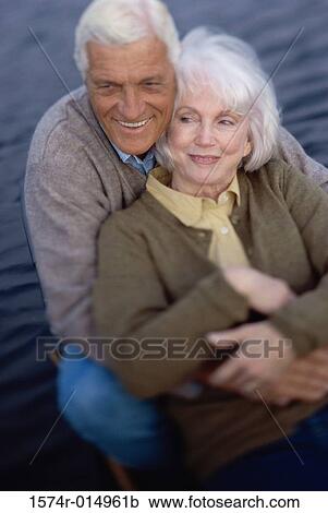 Stock Image - Senior couple embracing each other. Fotosearch