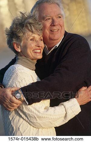 Senior couple holding each other View Large Photo Image Stock Image - Senior couple holding each other. Fotosearch