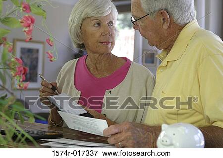 Stock Photo - Senior couple looking at each other. Fotosearch