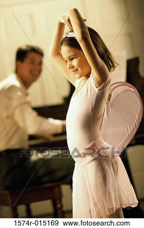 Side profile of a girl dancing View Large Photo Image Stock Photo - Side profile of a girl dancing. Fotosearch