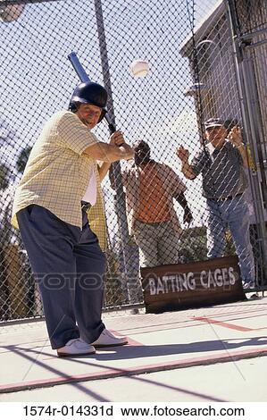 Stock Image - Side profile of a senior man playing baseball. Fotosearch