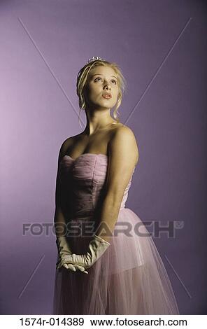 Side profile of a teenage girl looking up View Large Photo Image Stock Photo - Side profile of a teenage girl looking up. Fotosearch