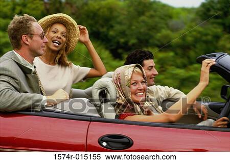 Side profile of two young couples sitting in a car View Large Photo Image Stock Photography - Side profile of two young couples sitting in a car. Fotosearch