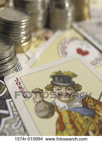 Stack of coins and playing cards View Large Photo Image Picture - Stack of coins and playing cards. Fotosearch