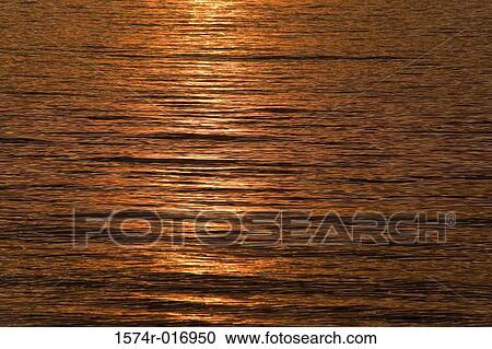 Sunlight reflecting off water View Large Photo Image Stock Image - Sunlight reflecting off water. Fotosearch