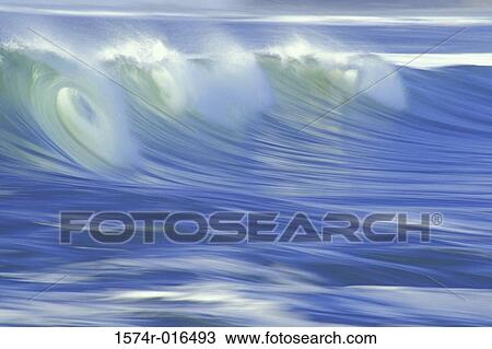 Stock Image - Waves breaking in the sea. Fotosearch