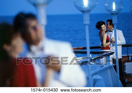 Young couple dancing on the deck of a cruise ship View Large Photo Image Stock Image - Young couple dancing on the deck of a cruise ship. Fotosearch