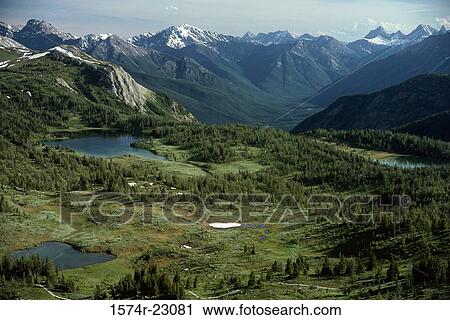 Aerial view of a mountain range View Large Photo Image Stock Image - Aerial view of a mountain range. Fotosearch