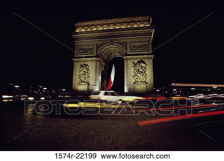Stock Photo - Arc de Triomphe lit up at night, Paris, France. Fotosearch