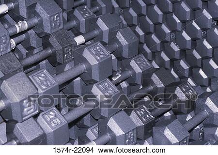 Array of dumbbells View Large Photo Image Picture - Array of dumbbells. Fotosearch