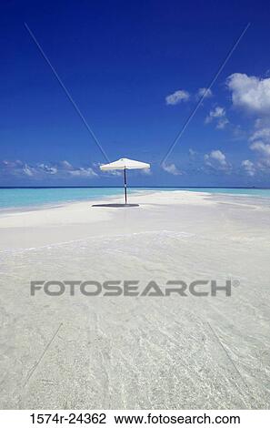Beach umbrella on the beach, Maayafushi, Maldives View Large Photo Image Stock Image - Beach umbrella on the beach, Maayafushi, Maldives. Fotosearch