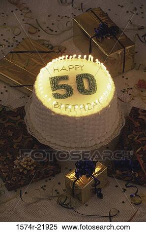Birthday cake with lit candles View Large Photo Image Stock Photography - Birthday cake with lit candles. Fotosearch
