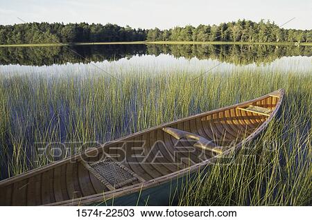 Boat on a lake View Large Photo Image Stock Image - Boat on a lake. Fotosearch