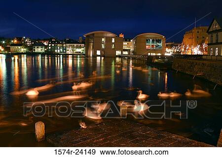 Buildings lit up at night, City Hall, Reykjavik, Iceland View Large Photo Image Stock Photo - Buildings lit up at night, City Hall, Reykjavik, Iceland. Fotosearch