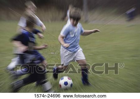 Children playing soccer View Large Photo Image Stock Photograph - Children playing soccer. Fotosearch