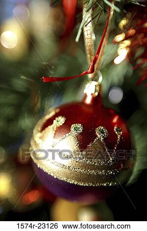 Close-up of a Christmas ornament on a Christmas tree View Large Photo Image Stock Photograph - Close-up of a Christmas ornament on a Christmas tree. Fotosearch