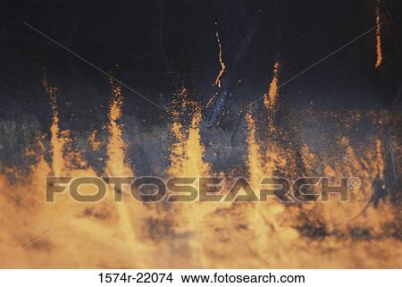 Close-up of a flames of a fire View Large Photo Image Picture - Close-up of a flames of a fire. Fotosearch