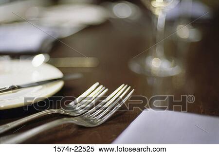 Close-up of a fork on a dining table View Large Photo Image Stock Photography - Close-up of a fork on a dining table. Fotosearch