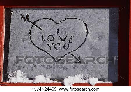 Close-up of a heart carved on a window View Large Photo Image Stock Photo - Close-up of a heart carved on a window. Fotosearch
