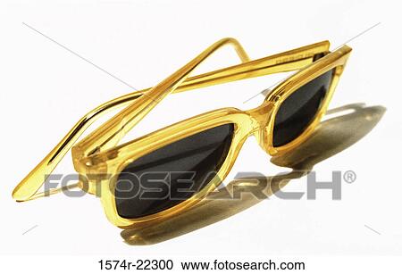 Close-up of a pair of sunglasses View Large Photo Image Stock Image - Close-up of a pair of sunglasses. Fotosearch