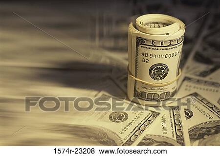 Close-up of a roll of American dollar bills View Large Photo Image Stock Photo - Close-up of a roll of American dollar bills. Fotosearch