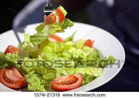 Close-up of a salad on a plate View Large Photo Image Stock Photo - Close-up of a salad on a plate. Fotosearch