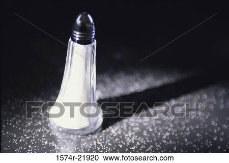 Close-up of a salt shaker View Large Photo Image Stock Image - Close-up of a salt shaker. Fotosearch