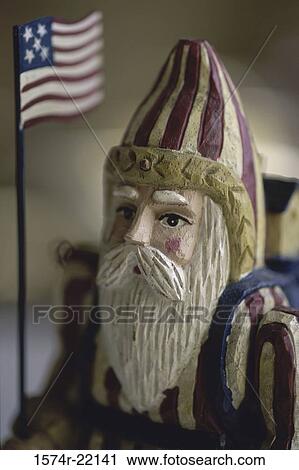 Stock Image - Close-up of a Santa Claus doll. Fotosearch