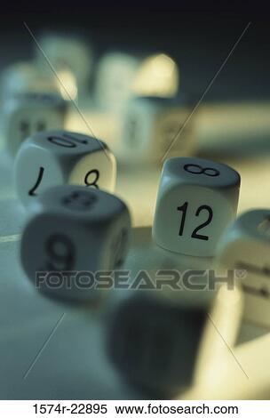 Stock Photography - Close-up of a stack of numbered dice. Fotosearch
