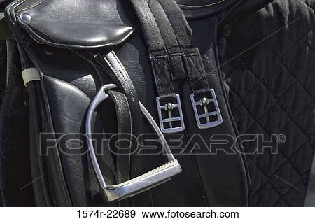 Close-up of a stirrup on a saddle View Large Photo Image Stock Photo - Close-up of a stirrup on a saddle. Fotosearch